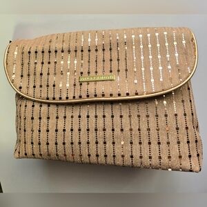 Vince Camuto rose gold travel case